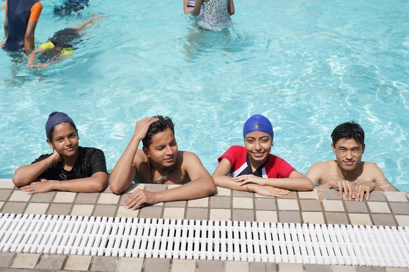 Indian boys and girls in cabin crew swimming survival training